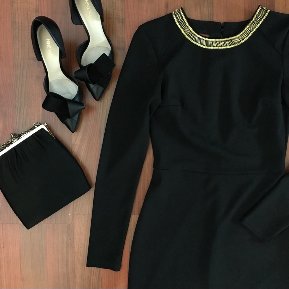 Little black dress with gold accents